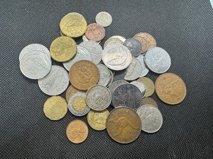 lot 28 image: Forty Four Mixed Foreign Coins Includes Mexico, Austria, Canada, Switzerland, Phillipines, Italy, Denmark, Australia, Norway, England, Germany, and Ireland