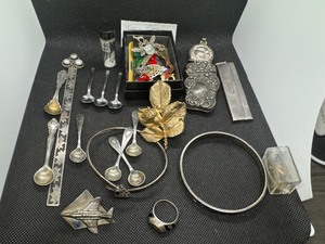 lot 40 image: Grab Bag of Miscellaneous Jewelry, Pins, Vial of .999 Silver, 6 miniature silver spoons, ring, bracelets, other metal items