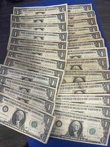 lot 45 image: 25 Circulated 1963B $1.00 Notes