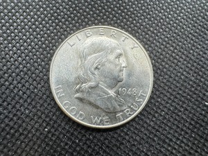 lot 70 image: 1948 BU Silver Franklin Dollar