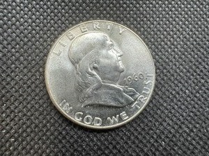 lot 84 image: 1960 BU Silver Franklin Dollar  Spectacular Coin