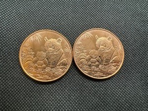 lot 94 image: Two 2012 One OZ .999 Copper Rounds Panda Design