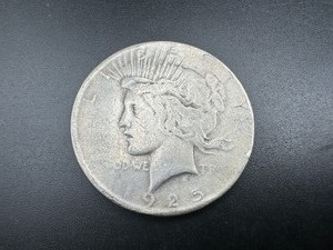 lot 58 image: 1925 Peace Silver Dollar
