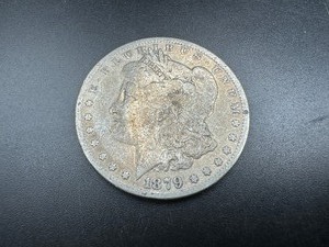lot 6 image: 1879 Morgan Silver Dollar