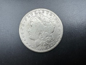lot 16 image: 1884 Morgan Silver Dollar