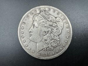 lot 20 image: 1891-O Morgan Silver Dollar