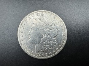 lot 27 image: 1900-O Morgan Silver Dollar