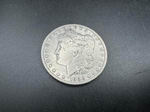 lot 28 image: 1900-O Morgan Silver Dollar