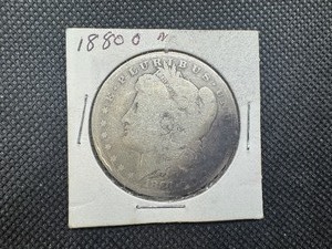 lot 95 image: 1880 O Morgan Silver Dollar