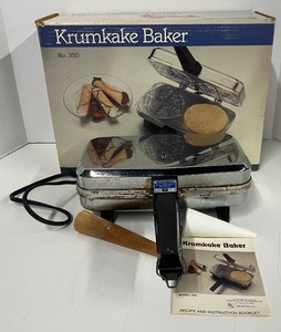 lot 27 image: Electric Krumkake Iron in Original Box