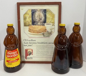 lot 64 image: Vintage Aunt Jemima Bottles (3) and Aunt Jemima Framed Vintage Advertisement