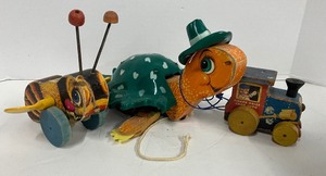 lot 67 image: Vintage Fisher Price Toys LOT Tuggy Turtle, Choo Choo, Buzzy Bee Wooden Toys