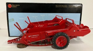 lot 18 image: McCormic Spreader Model 200 With Original Box