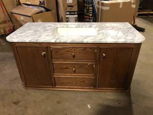lot 8 image: Home Decorators Collection Collette 48 in. Single Sink Cinnamon Oak Bath Vanity with White Carrara Marble Top (Assembled) Customer Returns See Pictures