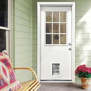 Steves & Sons 31-3/4 in. x 79 in. Reliant Series Clear 9-Lite White Primed Fiberglass Front Door Slab with Large Pet Door    Customer Returns See Pictures