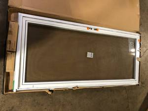 lot 27 image: Andersen Storm and Screen  Door  Customer Returns See Pictures