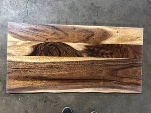 lot 66 image: 6 ft. L x 25 in. D Finished Saman Solid Wood Butcher Block Countertop in with Live Edge Customer Returns See Pictures
