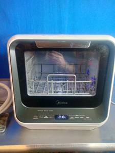 lot 25 image: Midea Portable Countertop Dishwasher.