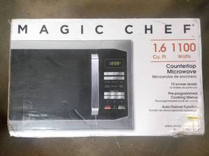 lot 29 image: Magic Chef 1.6 Cu. Ft. Countertop Microwave