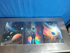 lot 75 image: Three-Panel Canvas Wall Art Set Featuring an Astronaut and Celestial Bodies