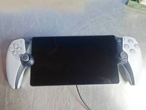 lot 100 image: PlayStation Portal Remote Player.
