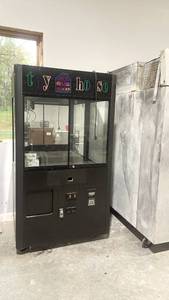 lot 8 image: Income Opportunity Toy House Claw Machine Arcade Game Cabinet