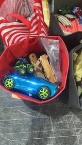 lot 65 image: Large Toy Collection including Dinosaurs, Trains, Cars, and Tracks