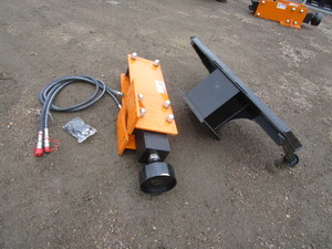 lot 23 image: Wolverine Skid Steer Post Pounder