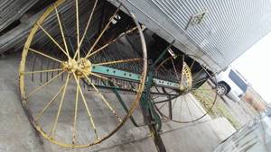lot 342 image: John Deere Side Delivery Rake. Wheels 54 in. Diam., 11 Ft. Long