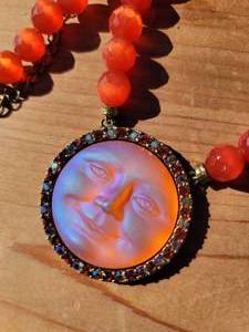 lot 32 image: Kirks Folly Tangerine Seaview Moon Face Necklace