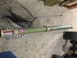 lot 22 image: Fish net and rod protector