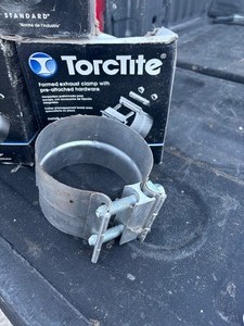 lot 90 image: New Exhaust Clamps