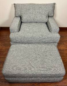 lot 85 image: Plumley SmokeTakara Rain Oversized Living Room Arm Chair and Ottoman by England Inc. 2023