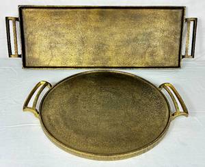 lot 92 image: Two Large Pottery Barn Metal  ServingDcor Trays Antique Brass Finish -18 round & 30 L