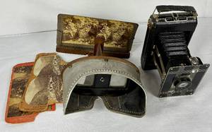 lot 102 image: Vintage Jiffy Kodak Six-20 Folding Camera and Keystone View Co Stereoscope with 3 Cards