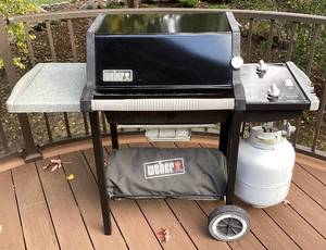lot 83 image: Weber Silver A Gas Grill, with Propane Tank and Cover