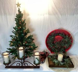 lot 129 image: Holiday Decorating Bundle - 4ft Pre-Lit Christmas Tree, Wreath, Candelabra Three Arm Centerpiece, Candle Wreath Centerpiece and Red Holiday Truck