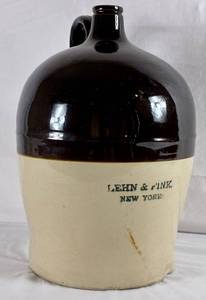 lot 4 image: Antique Lehn & Fink Large Stoneware Handle Jug, NY 1874