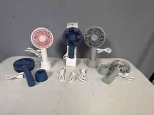 lot 89 image: Five Portable, Rechargeable, Hand-held Fans with base for use as desktop fan.  Includes USB Charging Cords