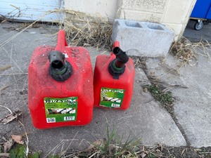 lot 27 image: Two Gas Cans - 2.5 Gallon and 1.25 Gallon