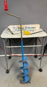 lot 50 image: Ice Fishing Necessities - Hand Augger, Two SkimmersScoops, and Artic Fisherman Tip Up