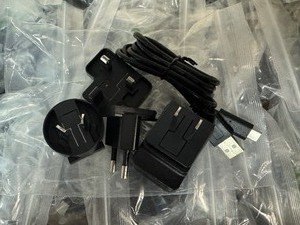 lot 63 image: Box of Traveler Charger Kits (Qty 24)