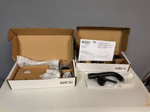 lot 76 image: Delta Trinsic Wall-Mount Bathroom Faucet. Qty 2.  Mostly Complete Kit.   May be missing one piece of hardware.