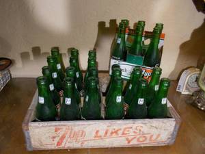lot 30 image: 7-up bottles and crate