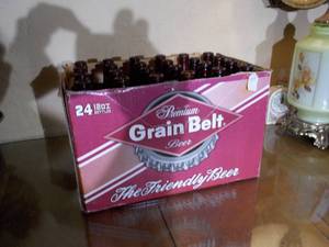 lot 31 image: Brown bottles and Grain belt cardboard box