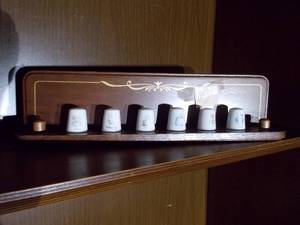 lot 55 image: Collectable Thimbles on a Shelf