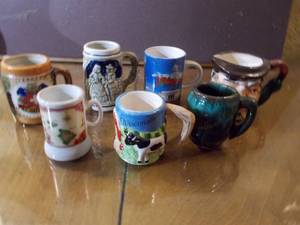 lot 94 image: Miniature mugs