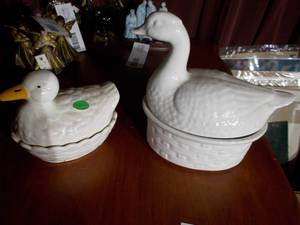 lot 159 image: The image displays 2 white ceramic duck-shaped soup tureens with a lids.