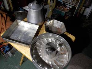 lot 353 image: Vintage metal baking pans and pots.