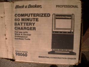 lot 381 image: Black & Decker 9.6V Scrudrill charger base.